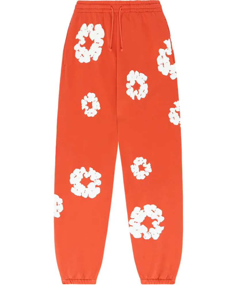 Denim Tears - Comfy Cotton Sweatpants with Orange Wreath Design