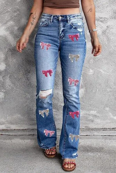 Sequin Bow Distressed Bootcut Jeans